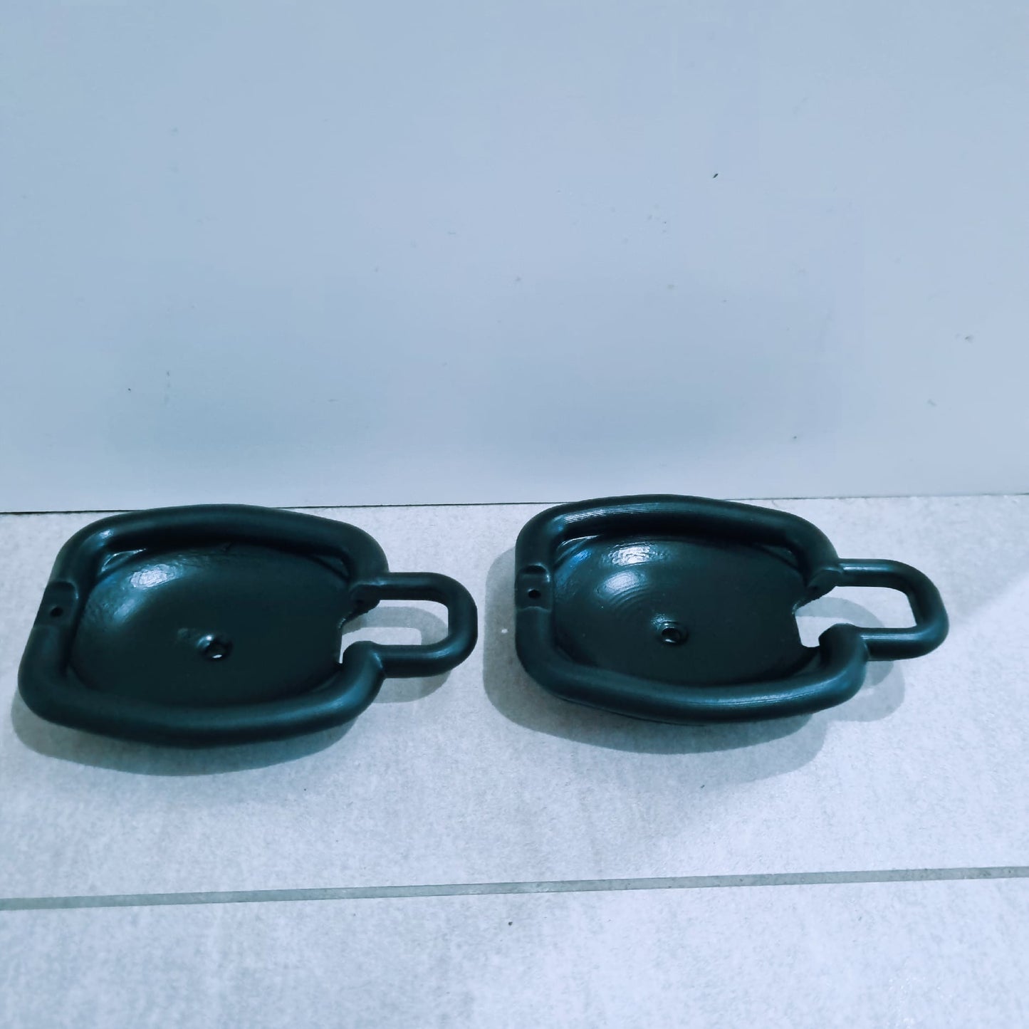 Mazda 1300 door handle surrounds plastic
