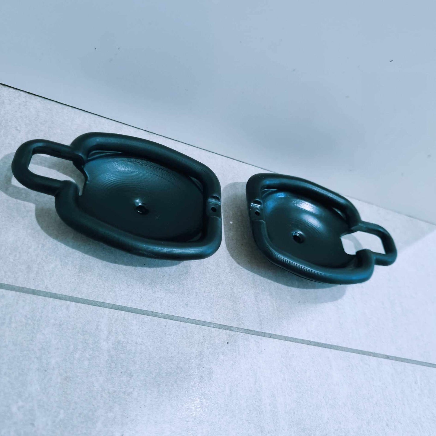 Mazda 1300 door handle surrounds plastic